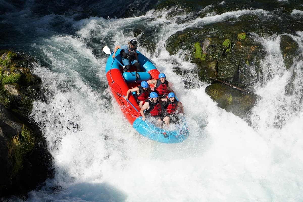Rafting over Class 5 Husum Falls on the White Salmon River in Washington State.